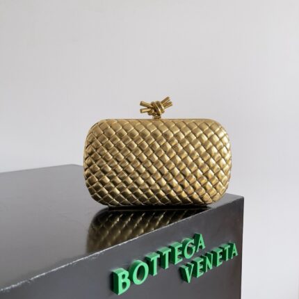 BOTTEGA VENETA  
Intreccio Leather Clutch Bag